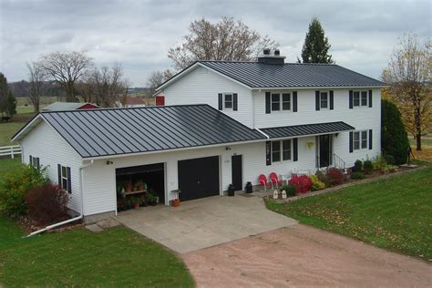 charcoal grey metal roof white house|gray metal roofing.